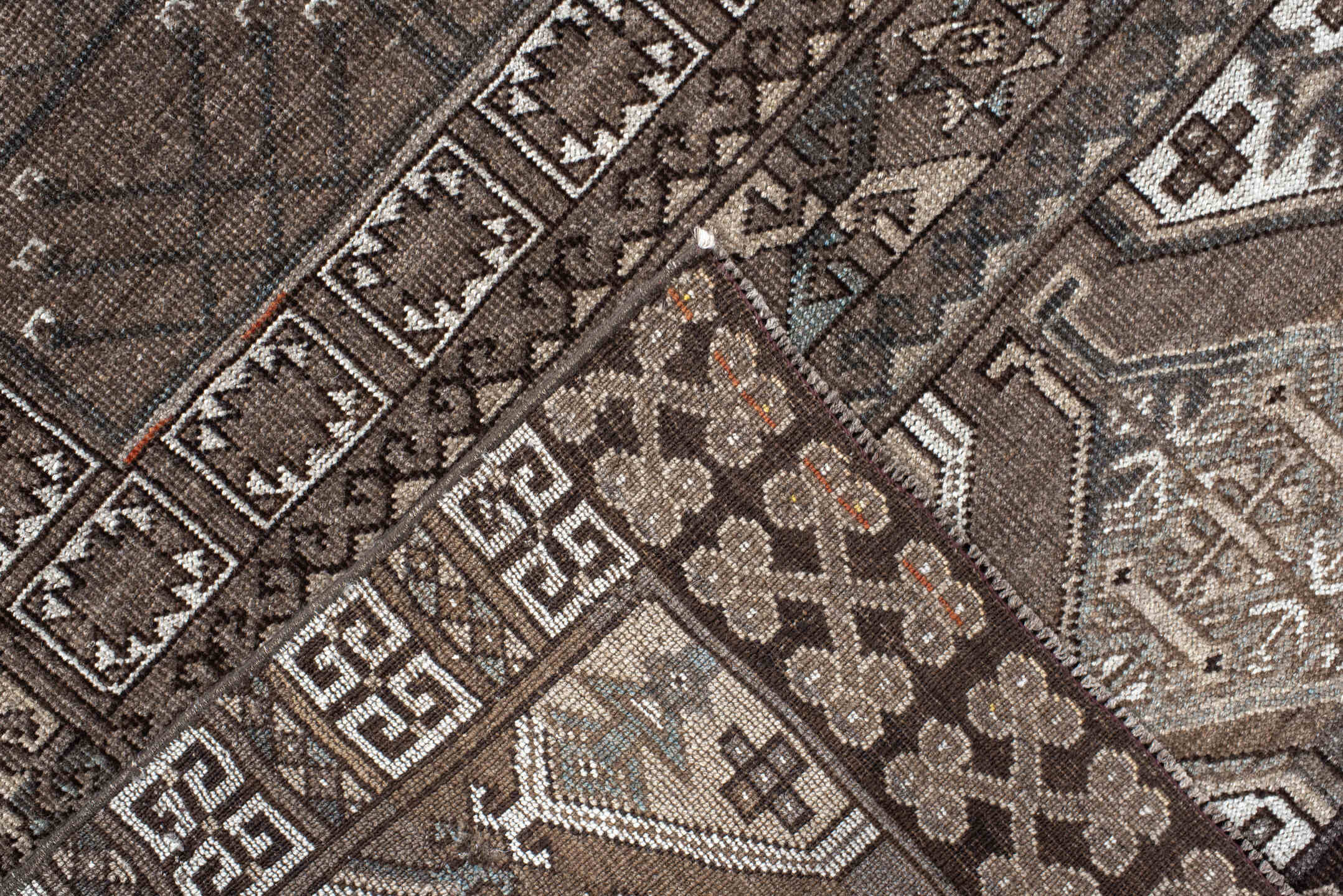 4' x 6' one-of-a-kind handmade vintage Belouch small size rug. Color palette: taupe, brown, ivory, charcoal, camel, slate