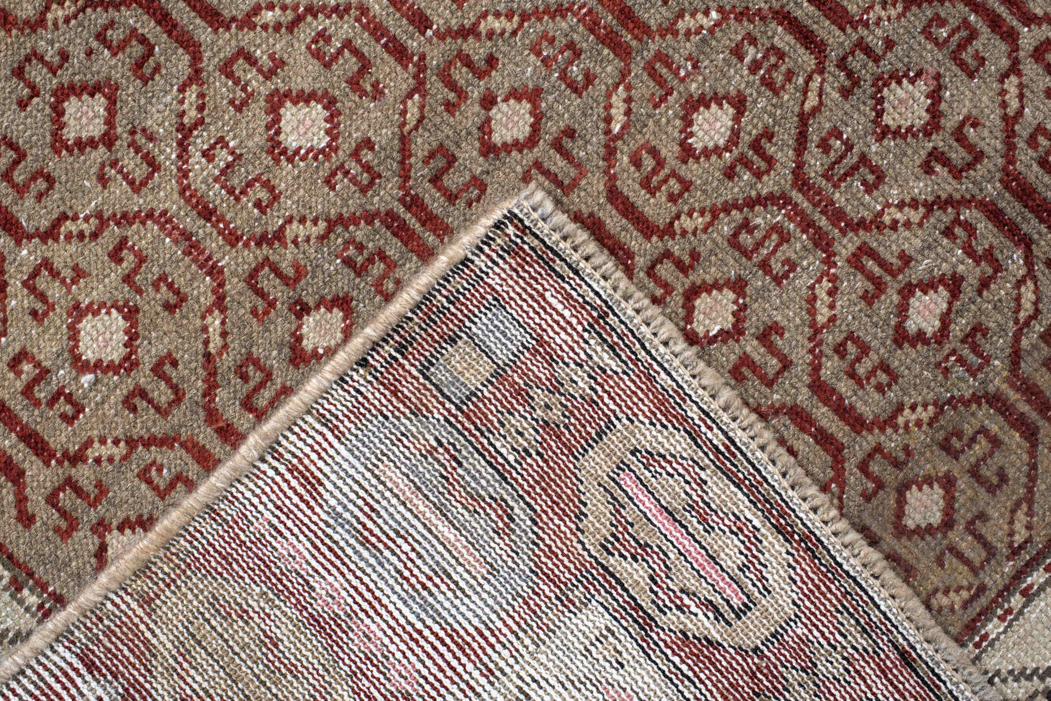 4' x 7' one-of-a-kind handmade vintage Anatol rug. Color palette: black, brown, gray, light gray, off-white, pink, red