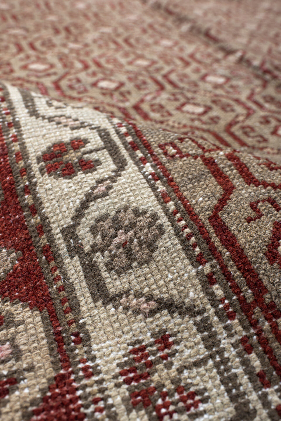4' x 7' one-of-a-kind handmade vintage Anatolian rug. Color palette: ivory, rust, rose, taupe, brown, terracotta, pink, red