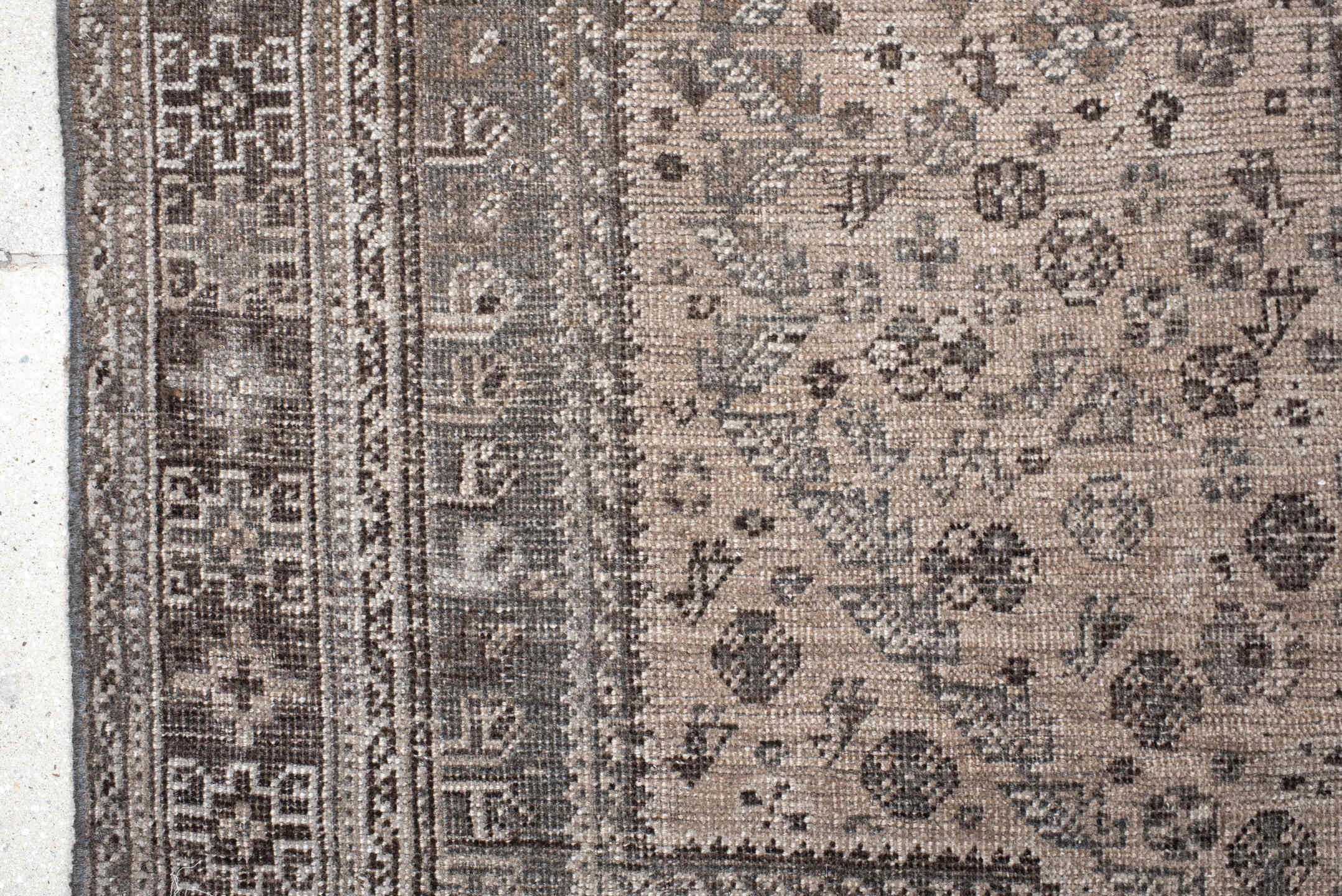 7' x 9' one-of-a-kind handmade vintage Shiraz rug. Color palette: ivory, taupe, brown, slate, charcoal, camel, beige, gray