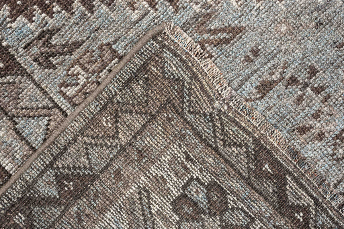 5' x 7' one-of-a-kind handmade antique Shiraz rug. Color palette: ivory, blue gray, taupe, brown, charcoal, sage, ochre