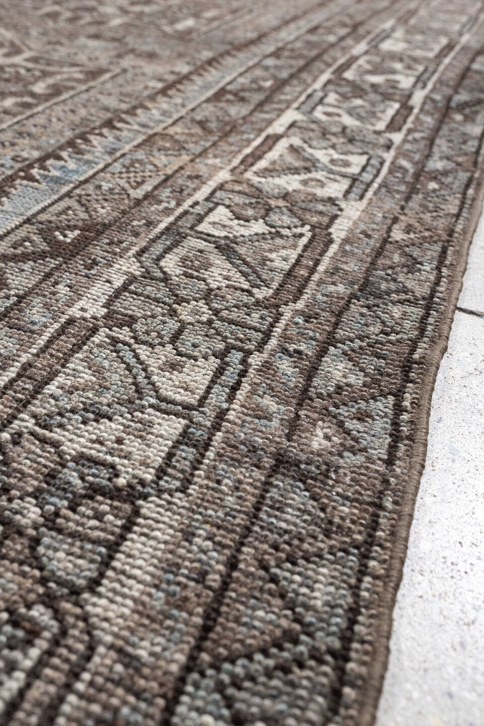 5' x 7' one-of-a-kind handmade antique Shiraz rug. Color palette: ivory, blue gray, taupe, brown, charcoal, sage, ochre