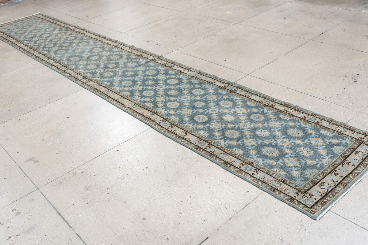 9' x 17' one-of-a-kind handmade antique Malayer rug. Color palette: blue gray, ivory, taupe, charcoal, sage, camel, gray