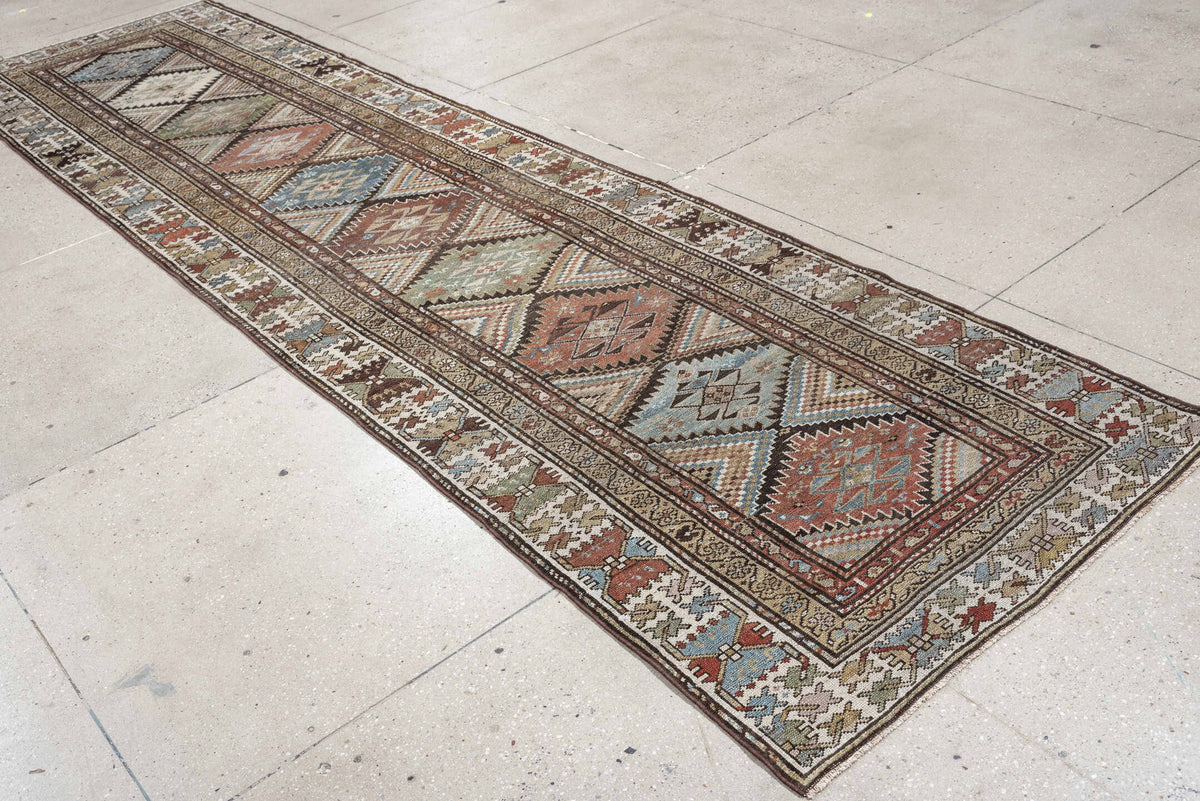 3' x 13' one-of-a-kind handmade antique NW Persian runner rug. Color palette: ivory, taupe, brown, slate blue, sage, rust