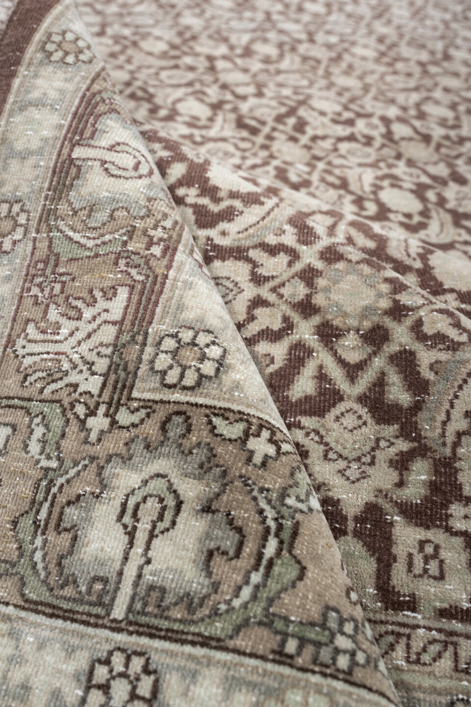 5' x 7' one-of-a-kind handmade antique Tabriz medium size rug. Color palette: ivory, taupe, warm brown, mushroom, beige