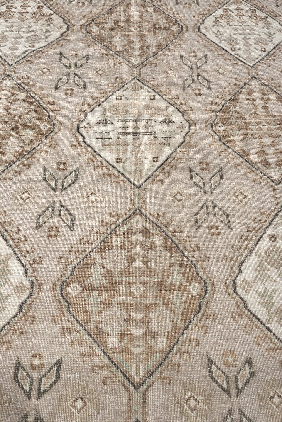 5' x 11' one-of-a-kind handmade antique Ardebil large size rug. Color palette: taupe, ivory, brown, charcoal, beige, camel