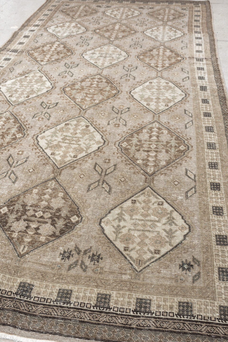 5' x 11' one-of-a-kind handmade antique Ardebil large size rug. Color palette: taupe, ivory, brown, charcoal, beige, camel