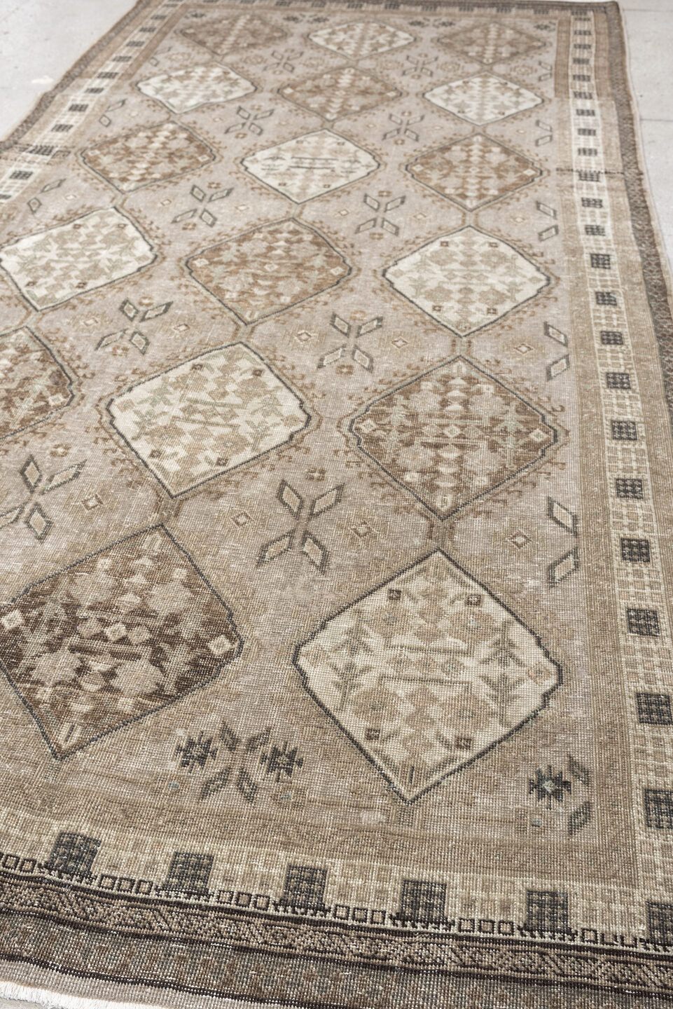 5' x 11' one-of-a-kind handmade antique Ardebil large size rug. Color palette: taupe, ivory, brown, charcoal, beige, camel