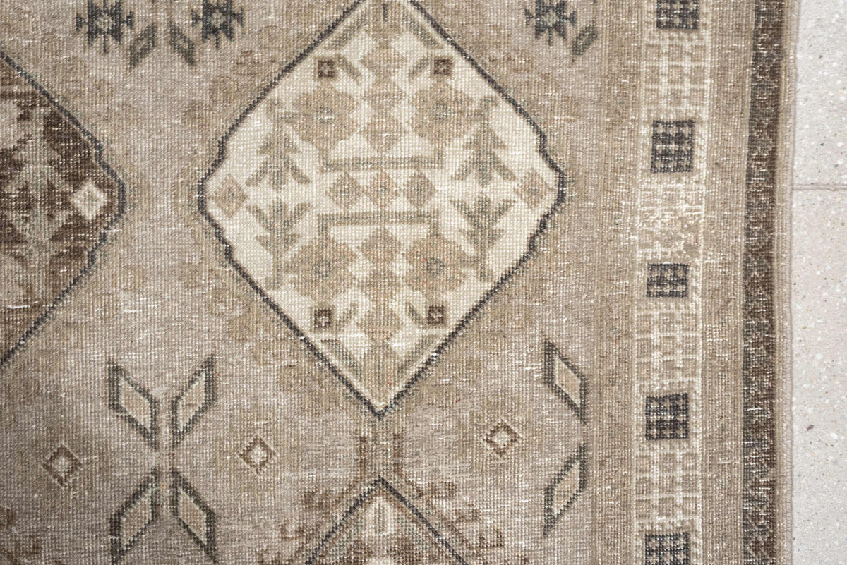 5' x 11' one-of-a-kind handmade antique Ardebil large size rug. Color palette: taupe, ivory, brown, charcoal, beige, camel