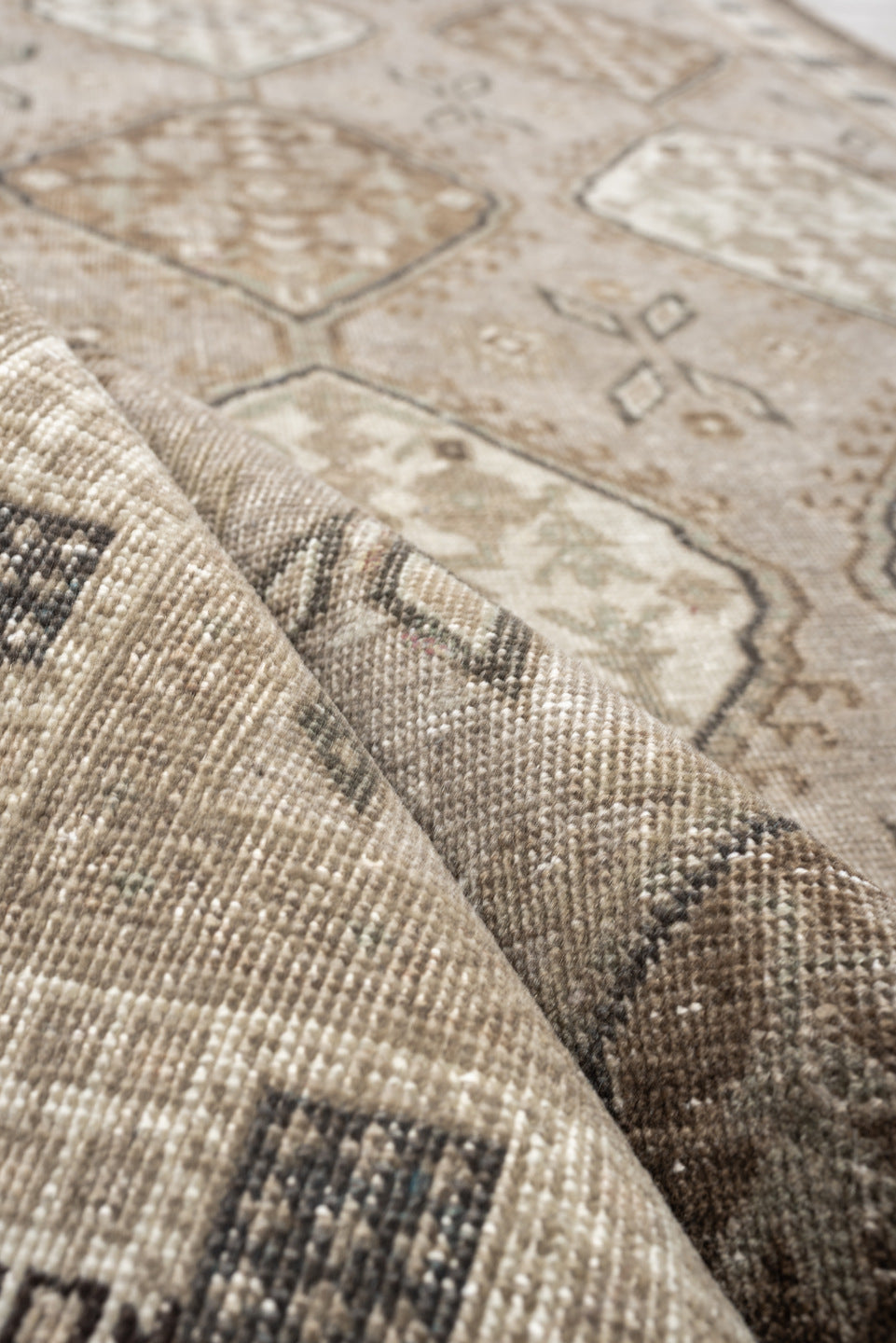 5' x 11' one-of-a-kind handmade antique Ardebil large size rug. Color palette: taupe, ivory, brown, charcoal, beige, camel
