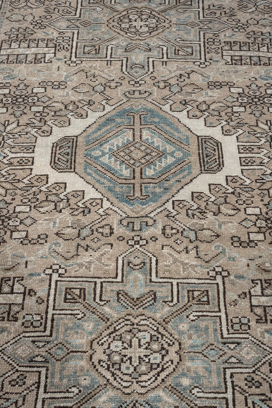 4' x 6' one-of-a-kind handmade antique Karaje rug. Color palette: ivory, powder blue, taupe, charcoal, brown, slate, cream
