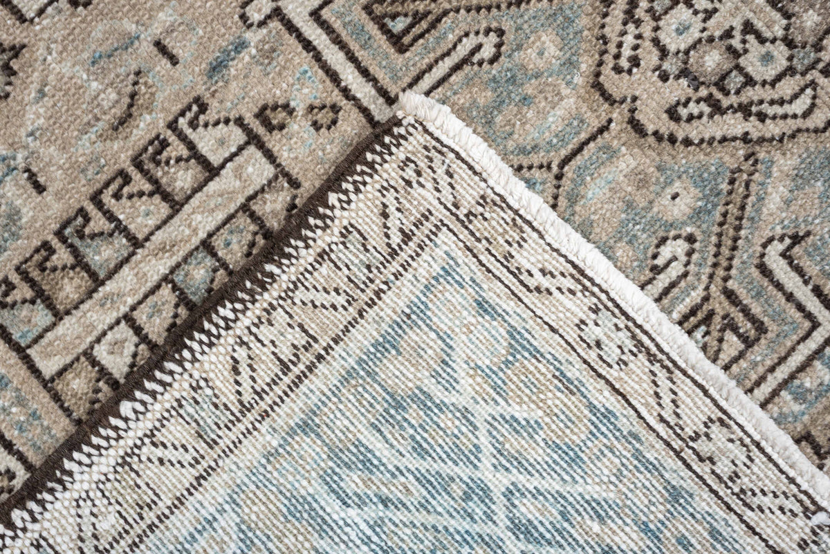 4' x 6' one-of-a-kind handmade antique Karaje rug. Color palette: ivory, powder blue, taupe, charcoal, brown, slate, cream