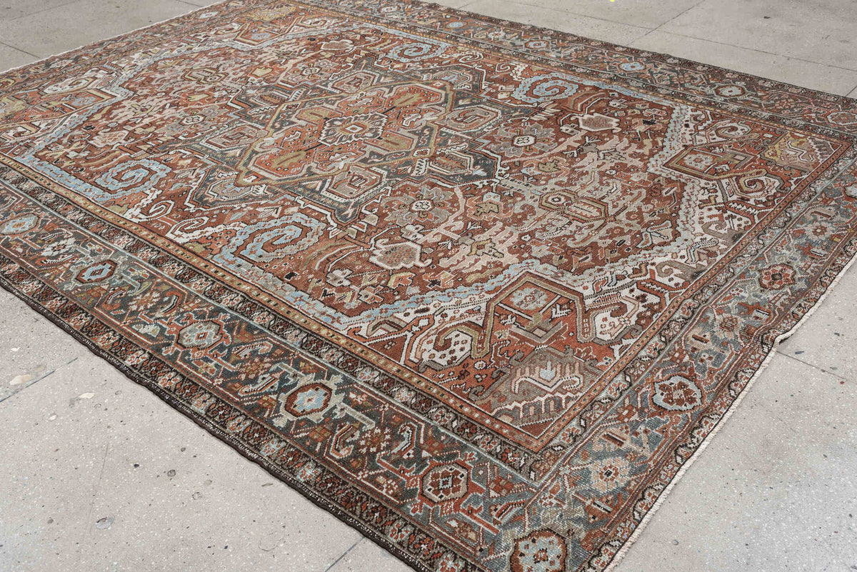 8' x 11' one-of-a-kind handmade antique Heriz large size rug. Color palette: terracotta, blue gray, ivory, charcoal, rust