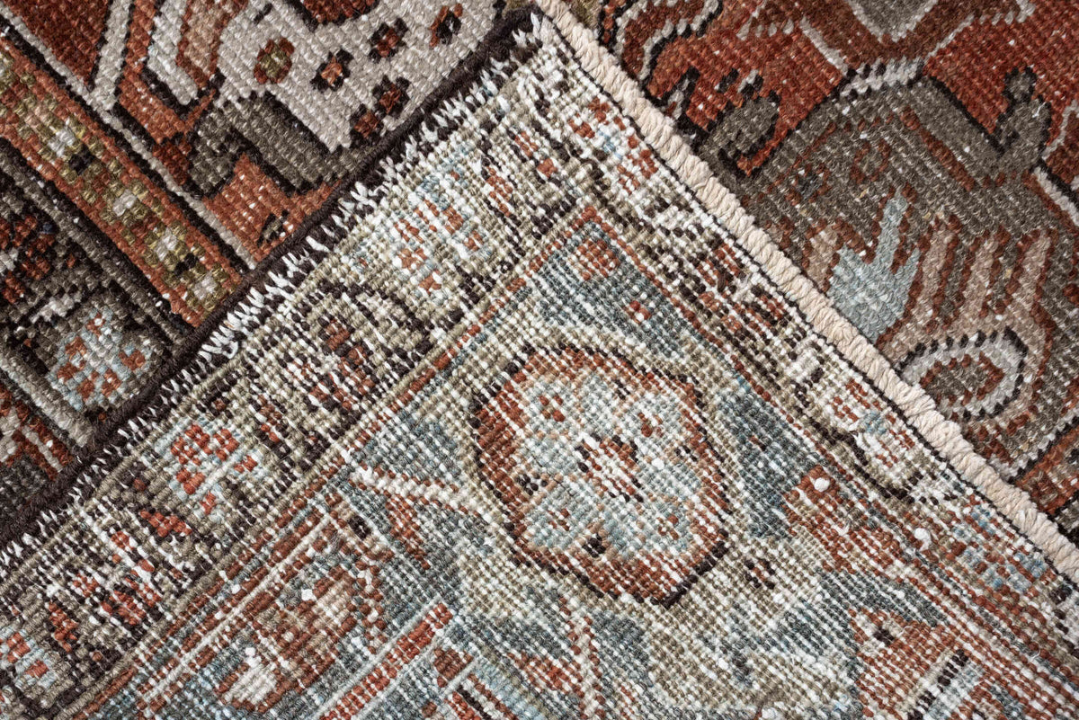 8' x 11' one-of-a-kind handmade antique Heriz large size rug. Color palette: terracotta, blue gray, ivory, charcoal, rust