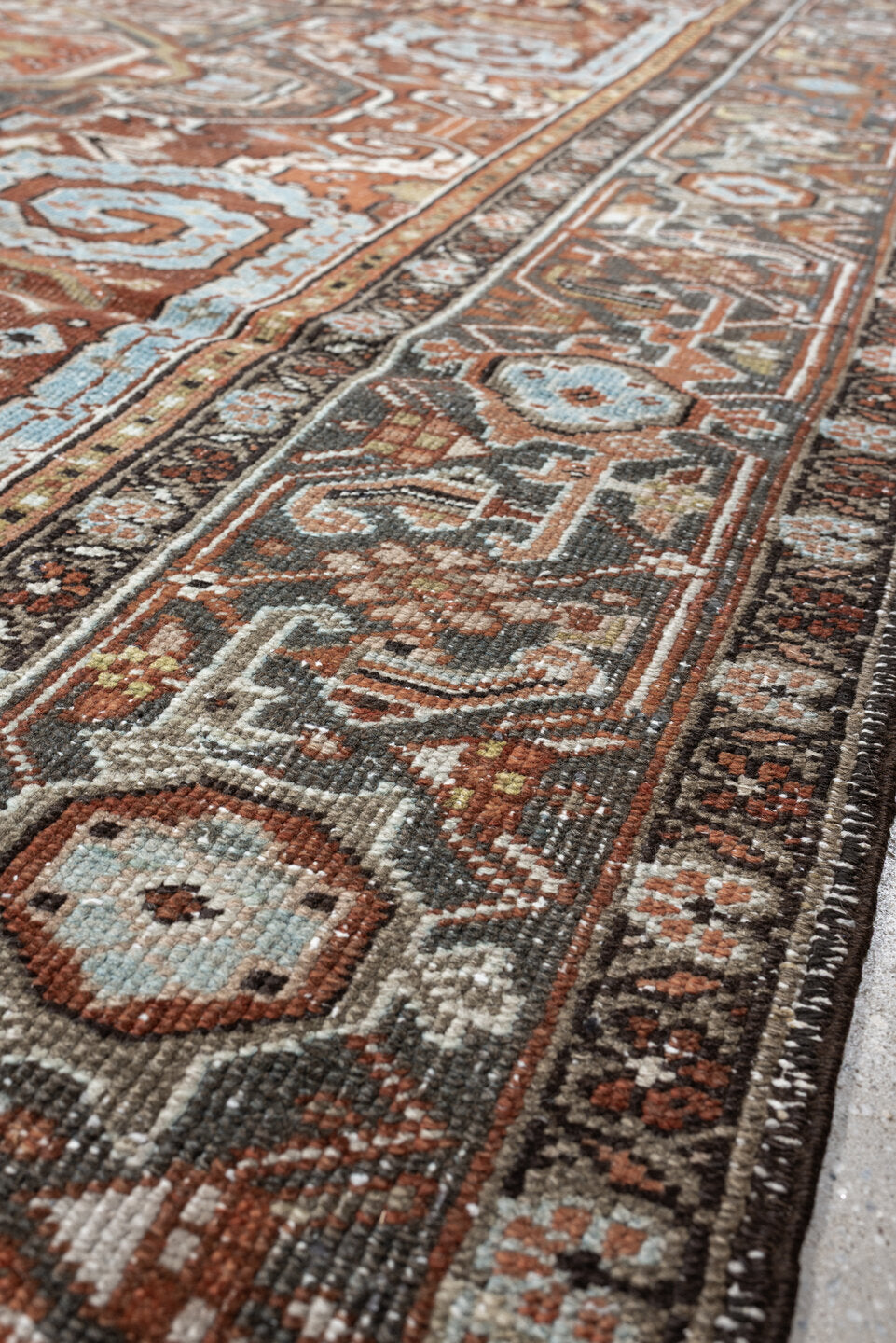 8' x 11' one-of-a-kind handmade antique Heriz large size rug. Color palette: terracotta, blue gray, ivory, charcoal, rust