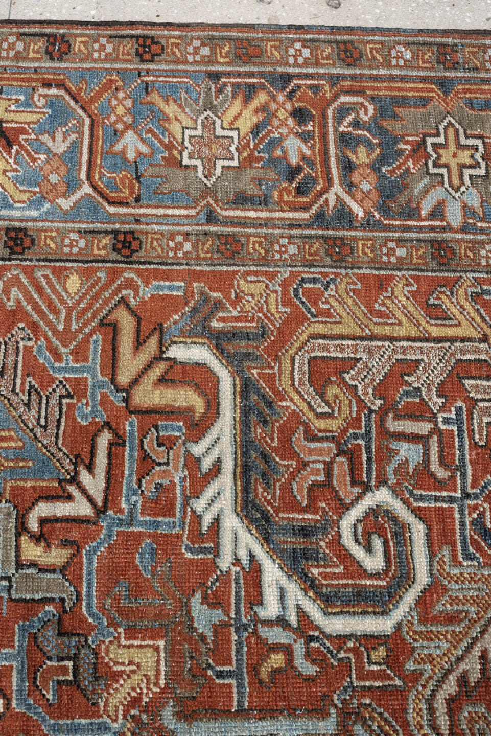 8' x 11' one-of-a-kind handmade antique Heriz large size rug. Color palette: rust, slate blue, ivory, camel, charcoal