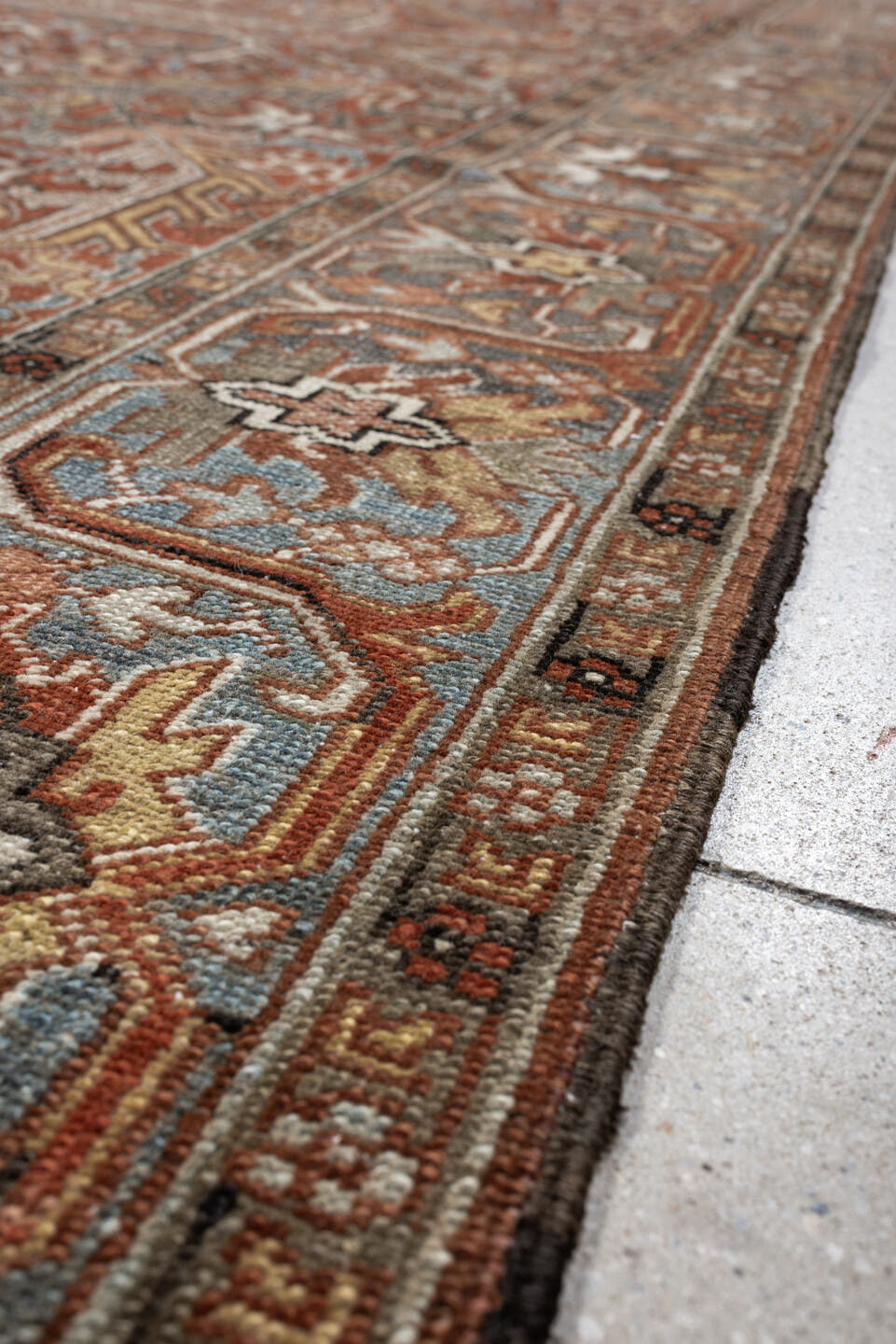 8' x 11' one-of-a-kind handmade antique Heriz large size rug. Color palette: rust, slate blue, ivory, camel, charcoal