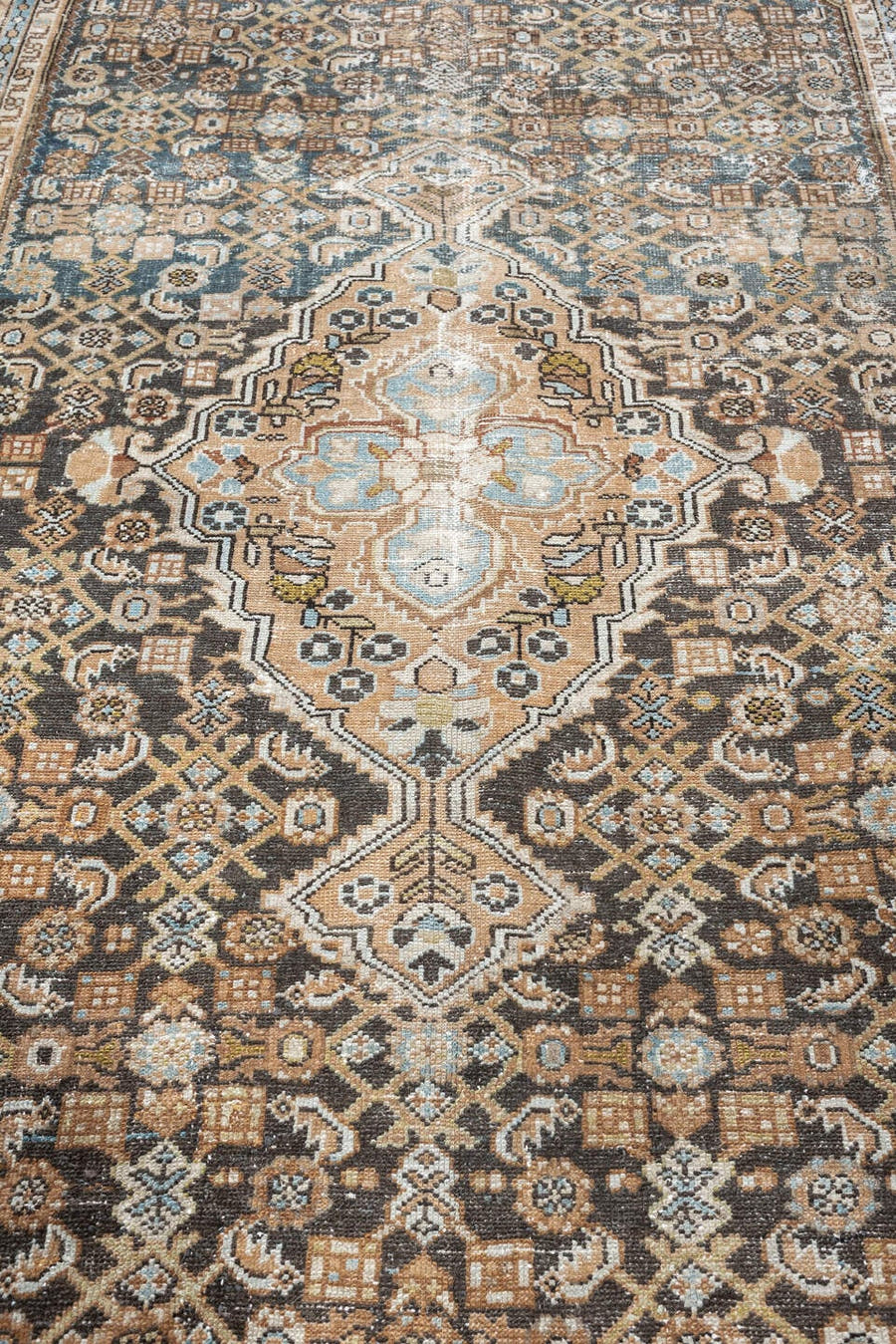 5' x 10' one-of-a-kind handmade antique Malayer runner rug. Color palette: charcoal, camel, ivory, powder blue, taupe, rust