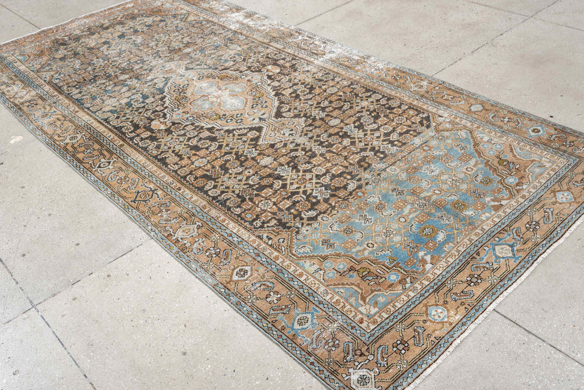 5' x 10' one-of-a-kind handmade antique Malayer runner rug. Color palette: charcoal, camel, ivory, powder blue, taupe, rust