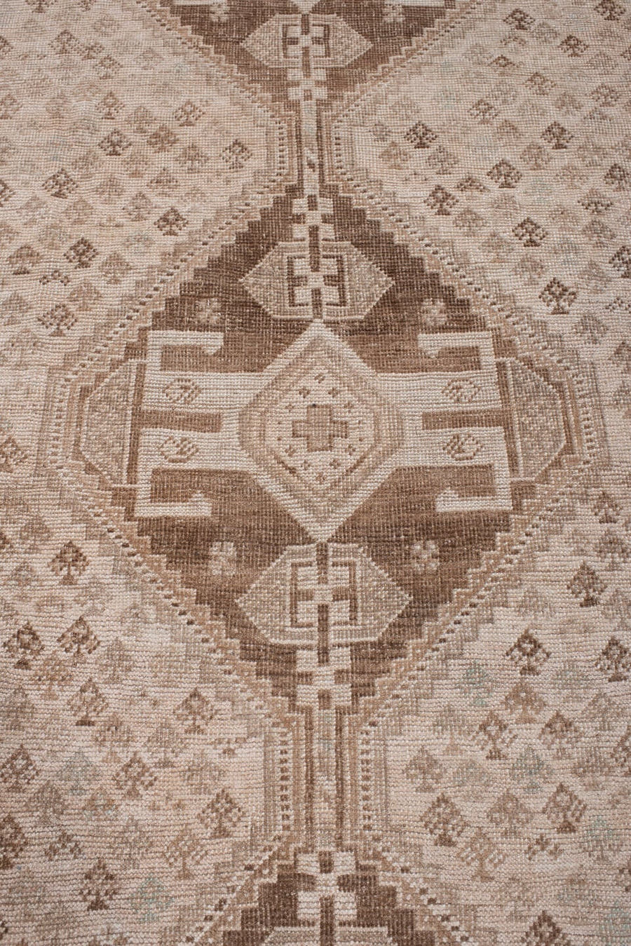 7' x 10' one-of-a-kind handmade antique Shhiraz large size rug. Color palette: ivory, taupe, camel, cocoa, sand, rose beige