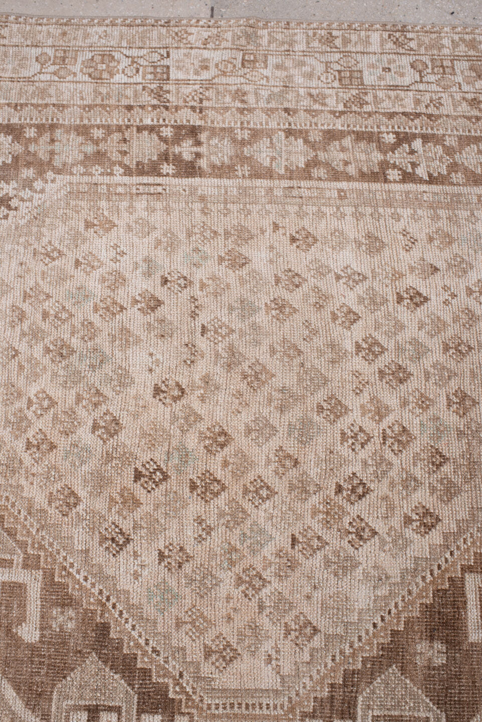 7' x 10' one-of-a-kind handmade antique Shhiraz large size rug. Color palette: ivory, taupe, camel, cocoa, sand, rose beige