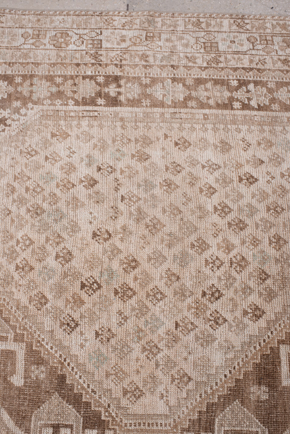 7' x 10' one-of-a-kind handmade antique Shhiraz large size rug. Color palette: ivory, taupe, camel, cocoa, sand, rose beige