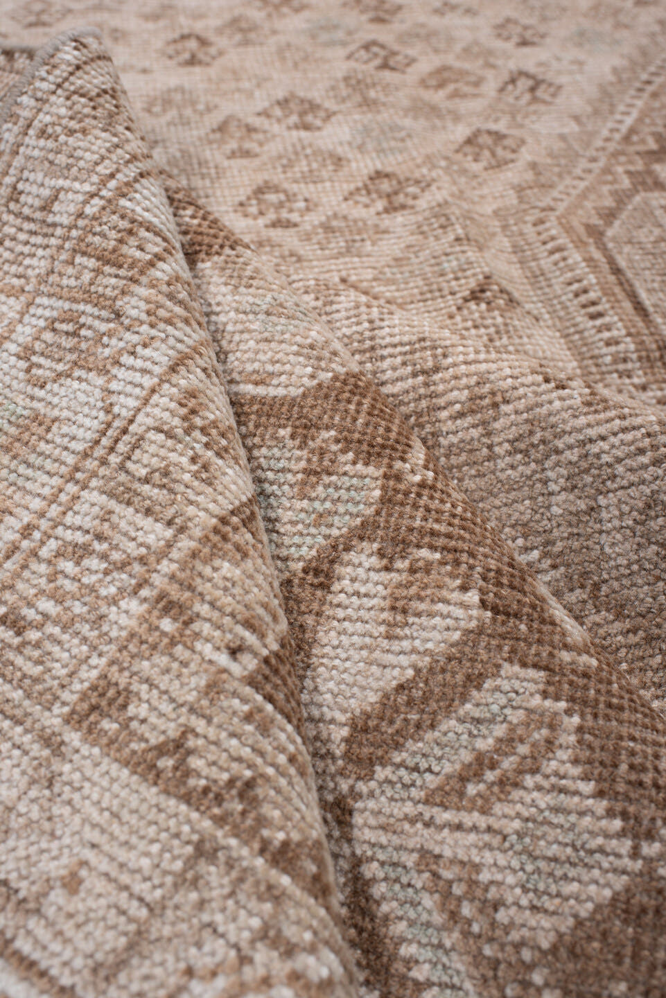 7' x 10' one-of-a-kind handmade antique Shhiraz large size rug. Color palette: ivory, taupe, camel, cocoa, sand, rose beige