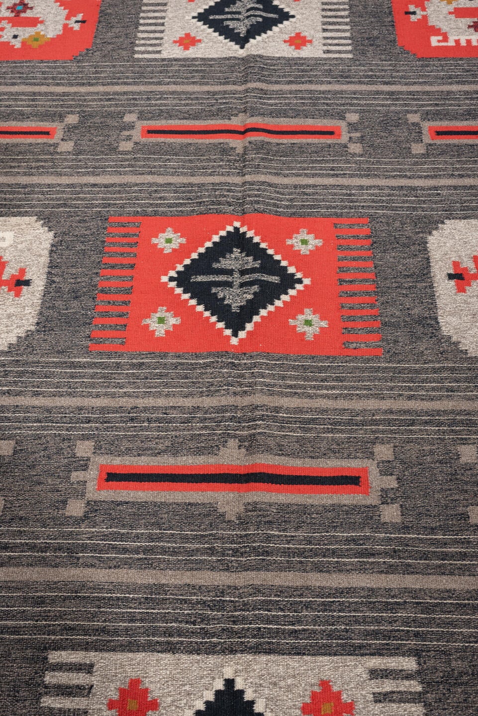 5' x 7' one-of-a-kind handmade antique Scandinavian medium size rug. Color palette: charcoal, coral, ivory, black, taupe