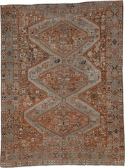 7' x 9' one-of-a-kind handmade antique Shiraz rug. Color palette: rust, pale blue gray, ivory, charcoal, terracotta, camel