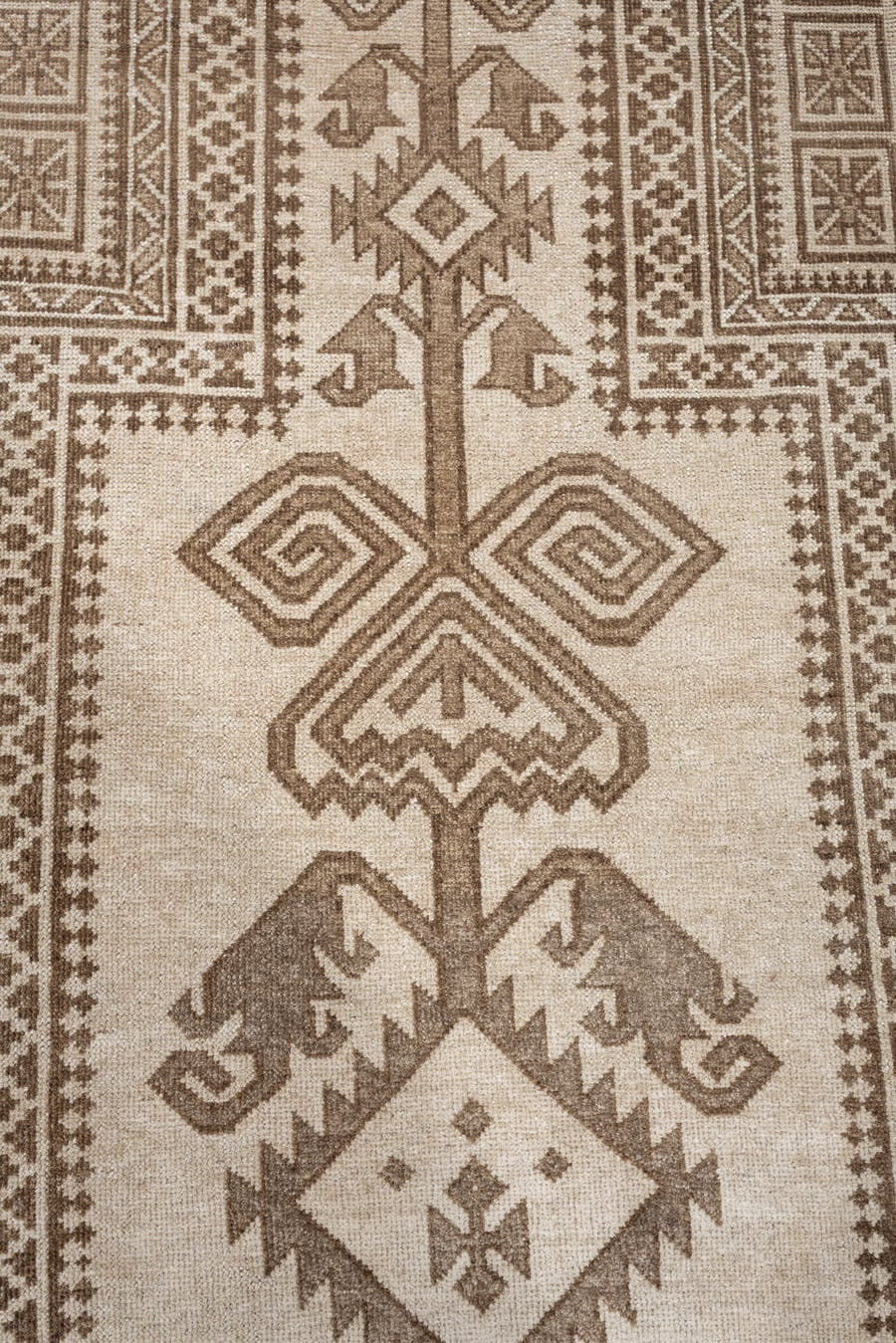 2' x 4' one-of-a-kind handmade antique Belouch small size rug. Color palette: ivory, taupe, camel, brown, beige, gray
