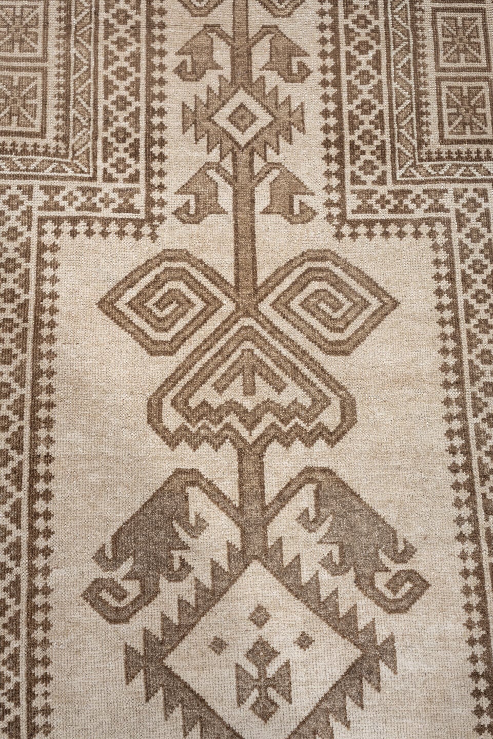 2' x 4' one-of-a-kind handmade antique Belouch small size rug. Color palette: ivory, taupe, camel, brown, beige, gray