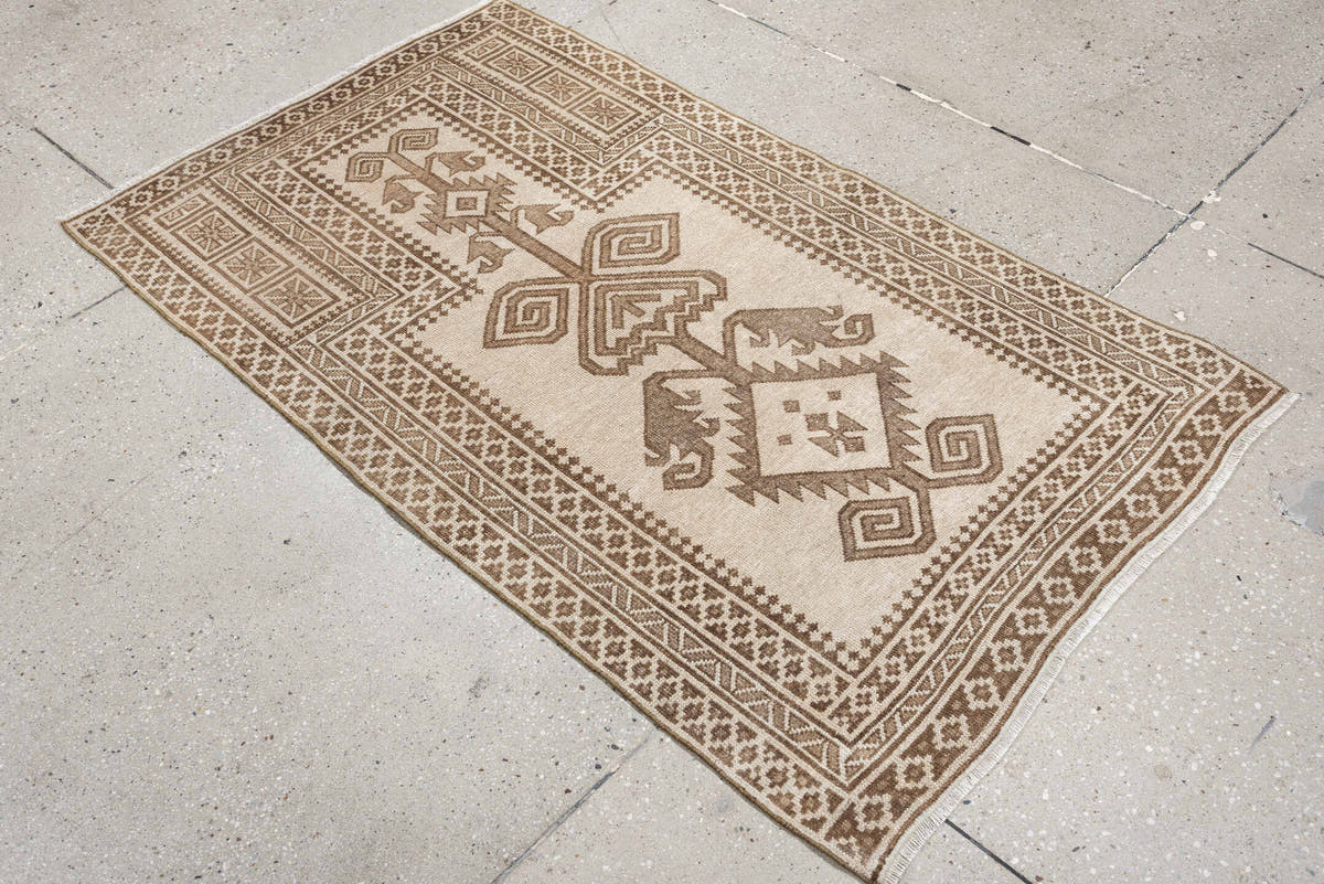 2' x 4' one-of-a-kind handmade antique Belouch small size rug. Color palette: ivory, taupe, camel, brown, beige, gray