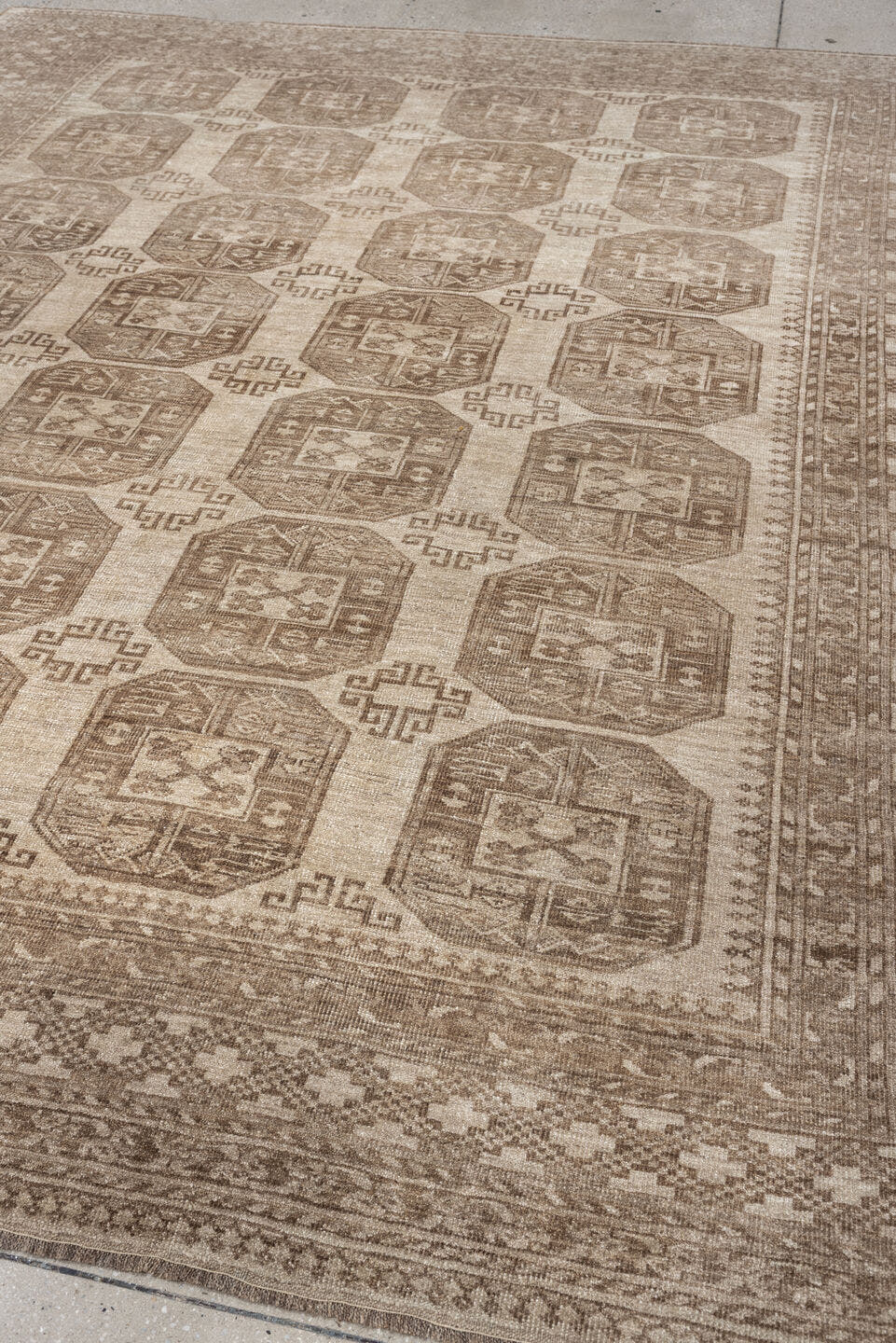 8' x 9' one-of-a-kind handmade antique Afghan large size rug. Color palette: ivory, taupe, sand, camel, beige, brown, gray
