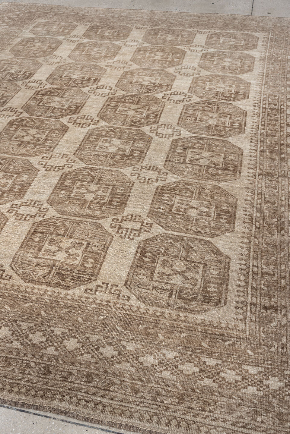 8' x 9' one-of-a-kind handmade antique Afghan large size rug. Color palette: ivory, taupe, sand, camel, beige, brown, gray