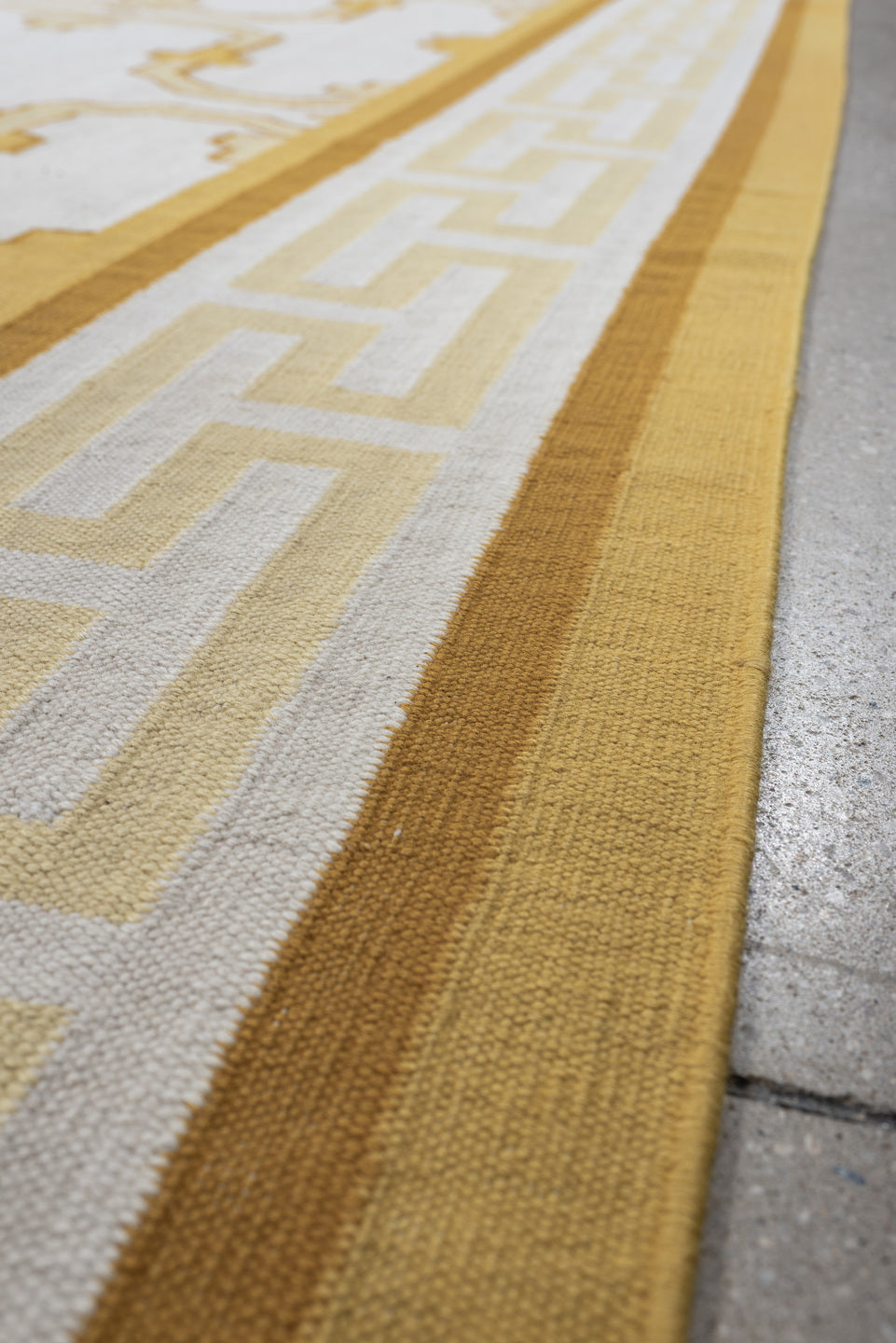 7' x 12' one-of-a-kind handmade antique Dhurrie large size rug. Color palette: ivory, saffron, gold, camel, cream