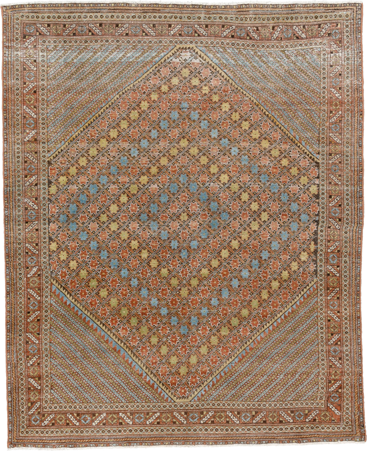5' x 6' one-of-a-kind handmade antique Afshar rug. Color palette: terracotta, ivory, muted blue, gold, rust, sage, charcoal