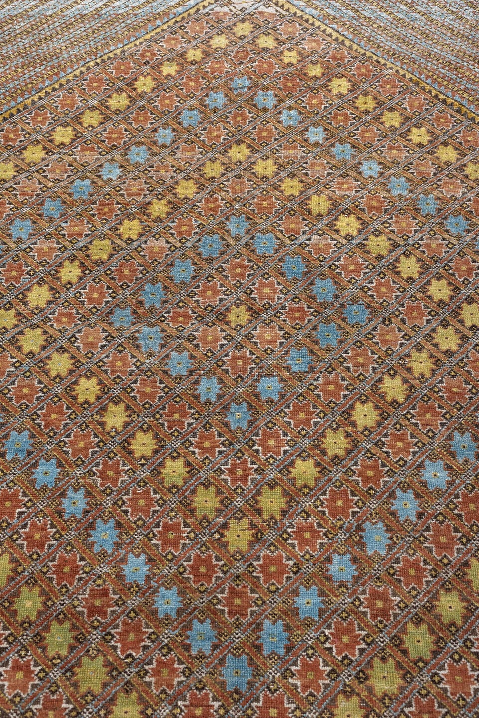 5' x 6' one-of-a-kind handmade antique Afshar rug. Color palette: terracotta, ivory, muted blue, gold, rust, sage, charcoal
