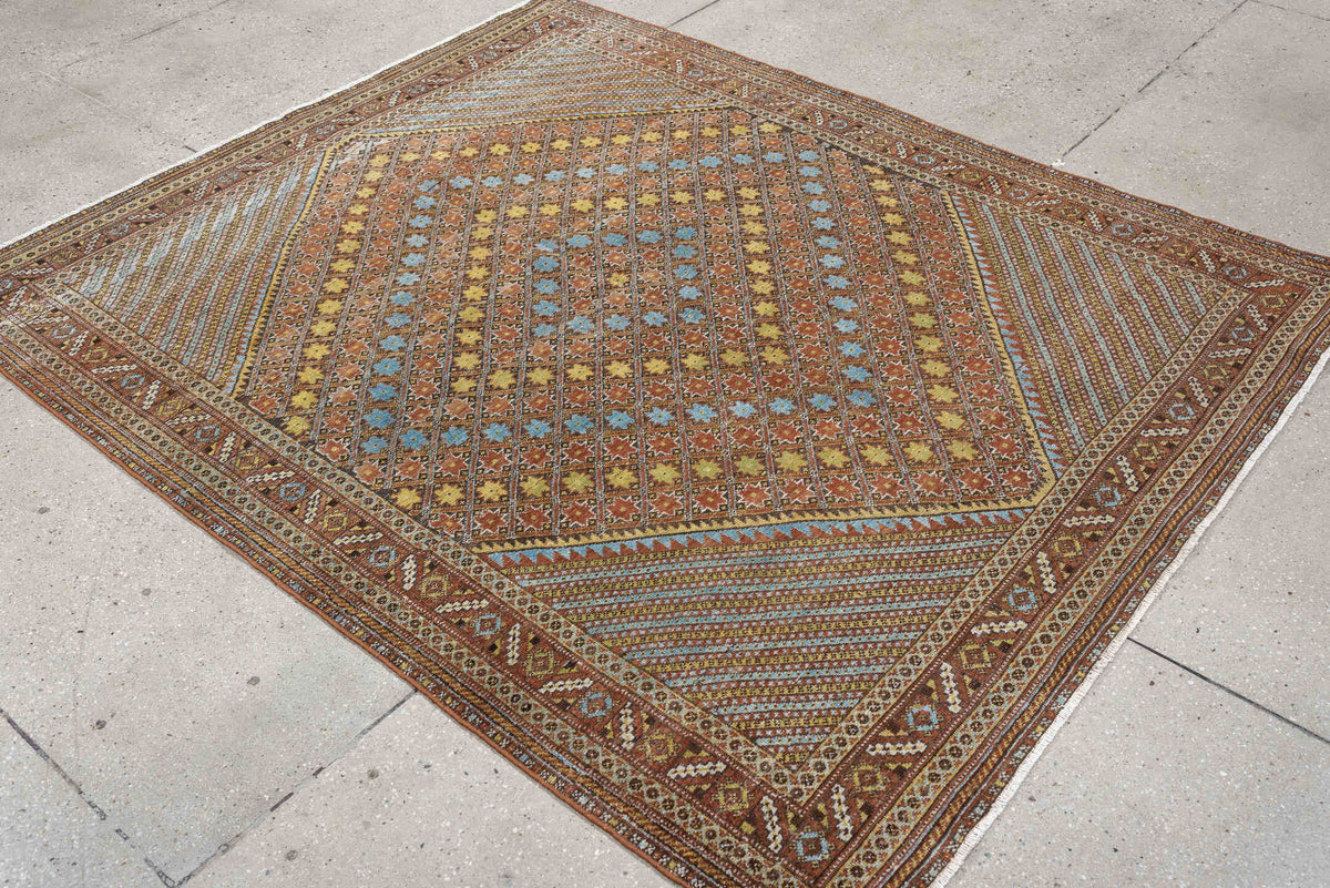5' x 6' one-of-a-kind handmade antique Afshar rug. Color palette: terracotta, ivory, muted blue, gold, rust, sage, charcoal