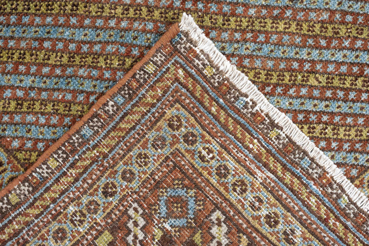 5' x 6' one-of-a-kind handmade antique Afshar rug. Color palette: terracotta, ivory, muted blue, gold, rust, sage, charcoal