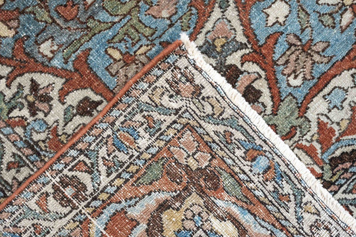 7' x 10' one-of-a-kind handmade antique Baktiary large size rug. Color palette: terracotta, ivory, turquoise, rust