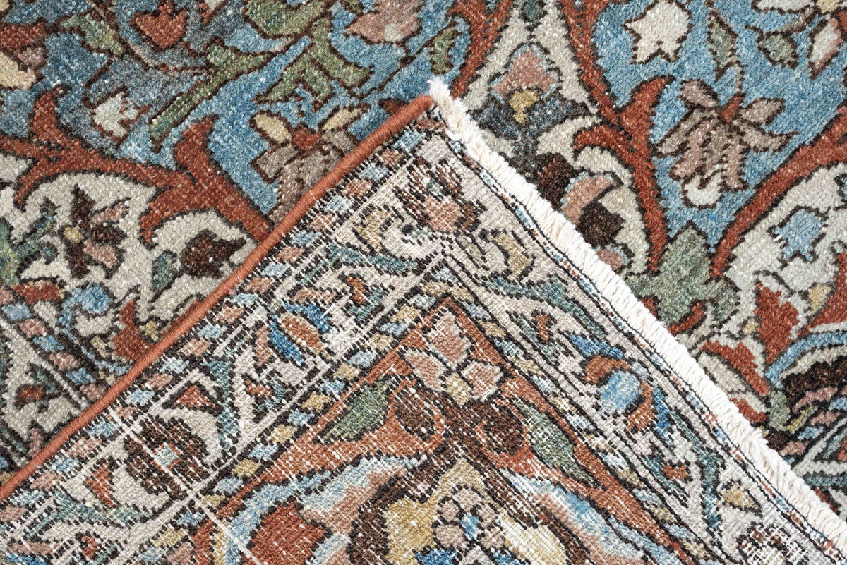 7' x 10' one-of-a-kind handmade antique Baktiary large size rug. Color palette: terracotta, ivory, turquoise, rust