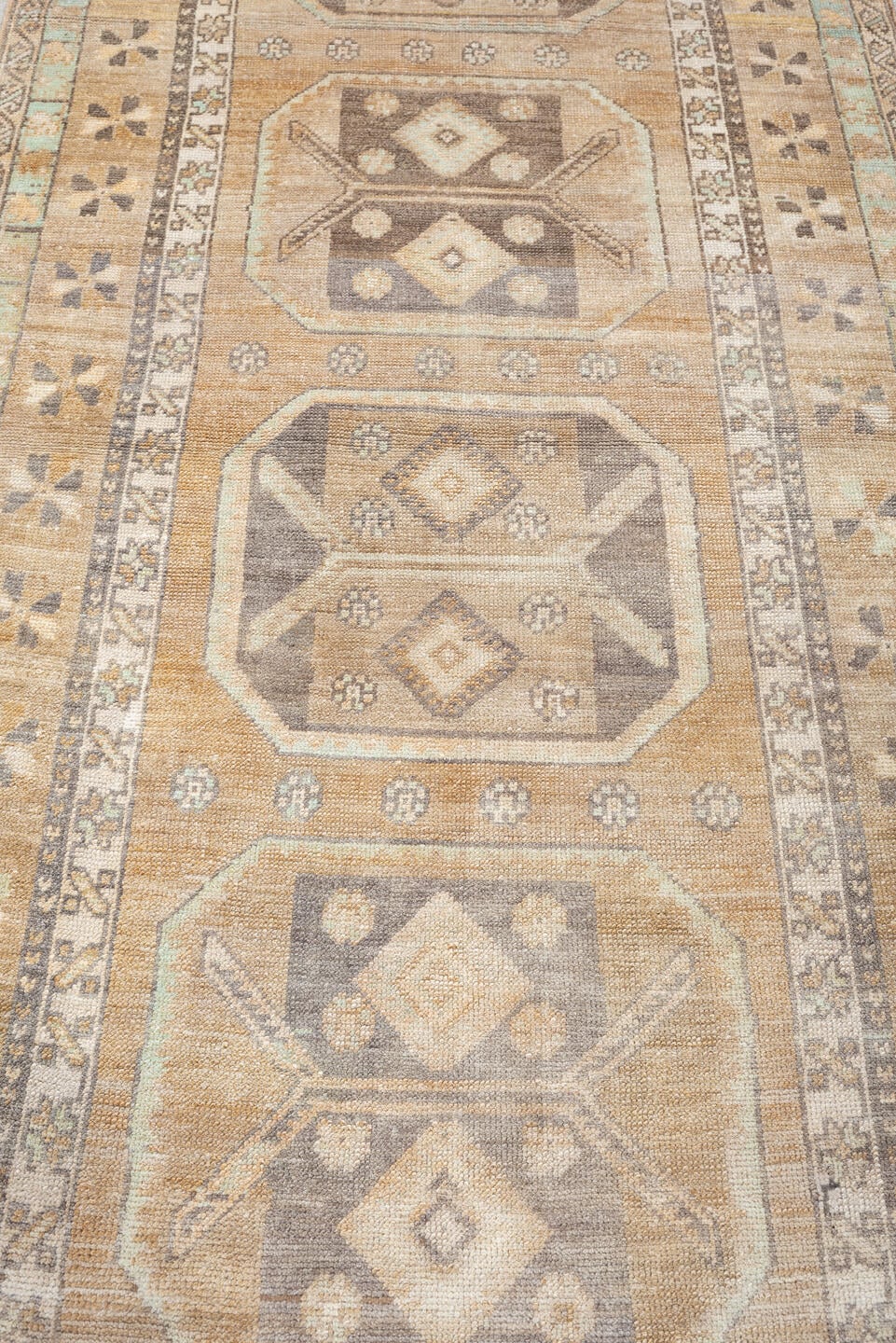 3' x 10' one-of-a-kind handmade antique Anatolian runner rug. Color palette: camel, ivory, taupe, charcoal, sage, terracotta