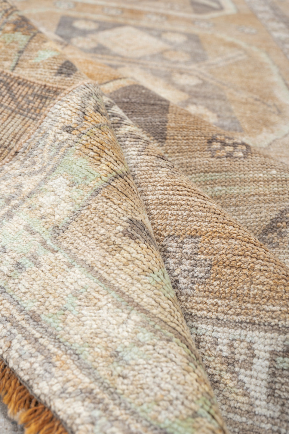 3' x 10' one-of-a-kind handmade antique Anatolian runner rug. Color palette: camel, ivory, taupe, charcoal, sage, terracotta