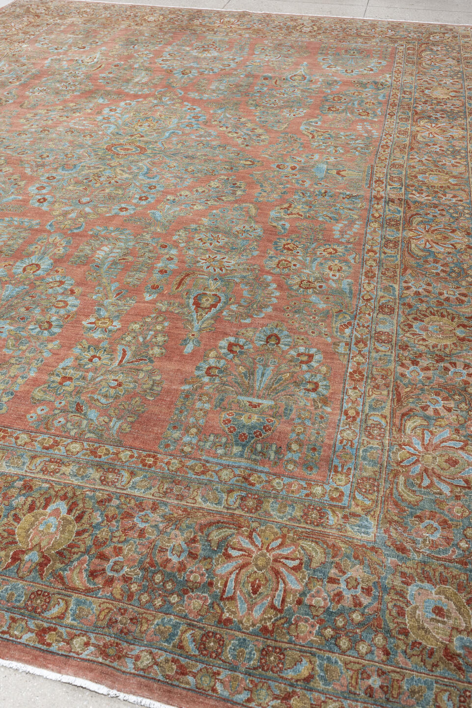 10' x 14' one-of-a-kind handmade antique Sarouk large size rug. Color palette: rose, teal, ivory, sage, rust, tan, coral