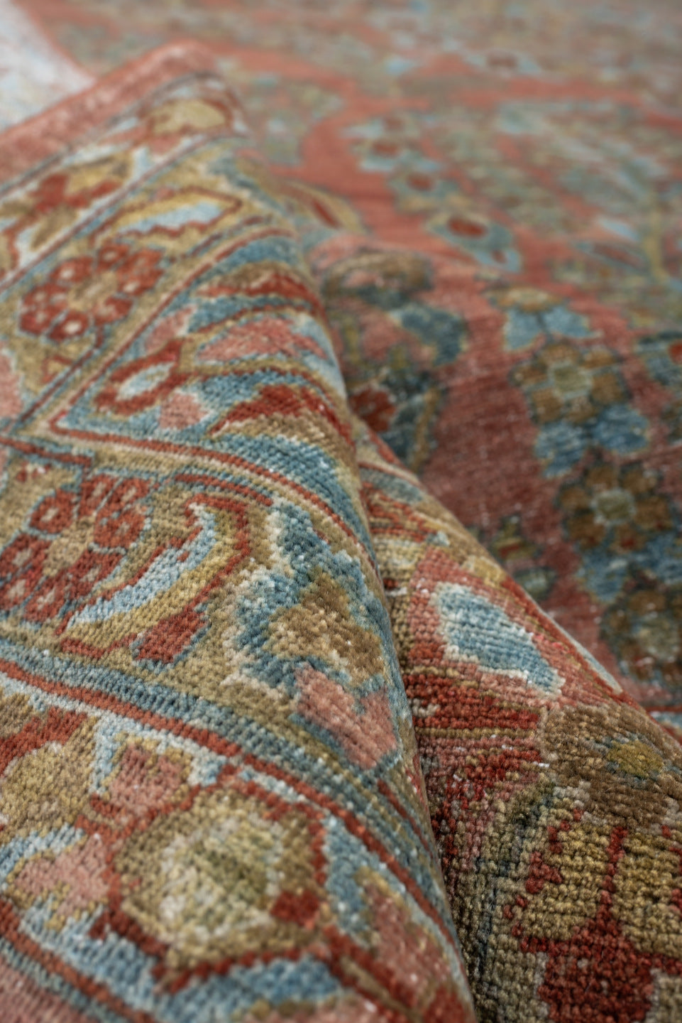 10' x 14' one-of-a-kind handmade antique Sarouk large size rug. Color palette: rose, teal, ivory, sage, rust, tan, coral