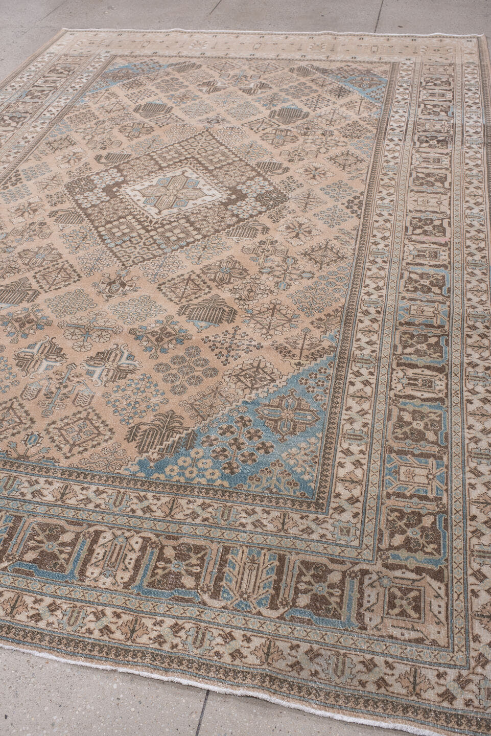 7' x 10' one-of-a-kind handmade antique Joshegan large size rug. Color palette: ivory, taupe, powder blue, charcoal, beige