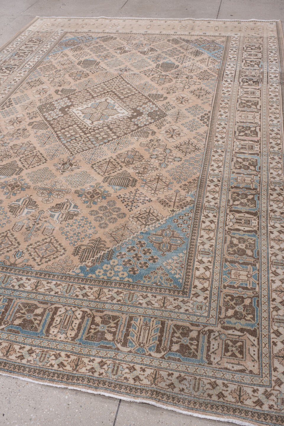 7' x 10' one-of-a-kind handmade antique Joshegan large size rug. Color palette: ivory, taupe, powder blue, charcoal, beige