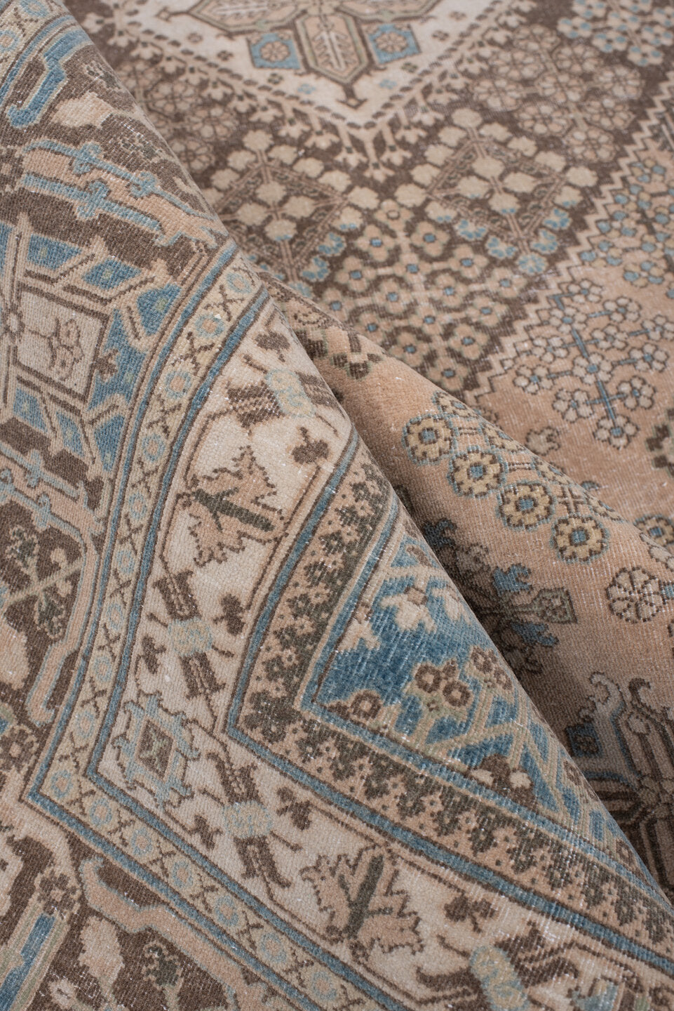 7' x 10' one-of-a-kind handmade antique Joshegan large size rug. Color palette: ivory, taupe, powder blue, charcoal, beige