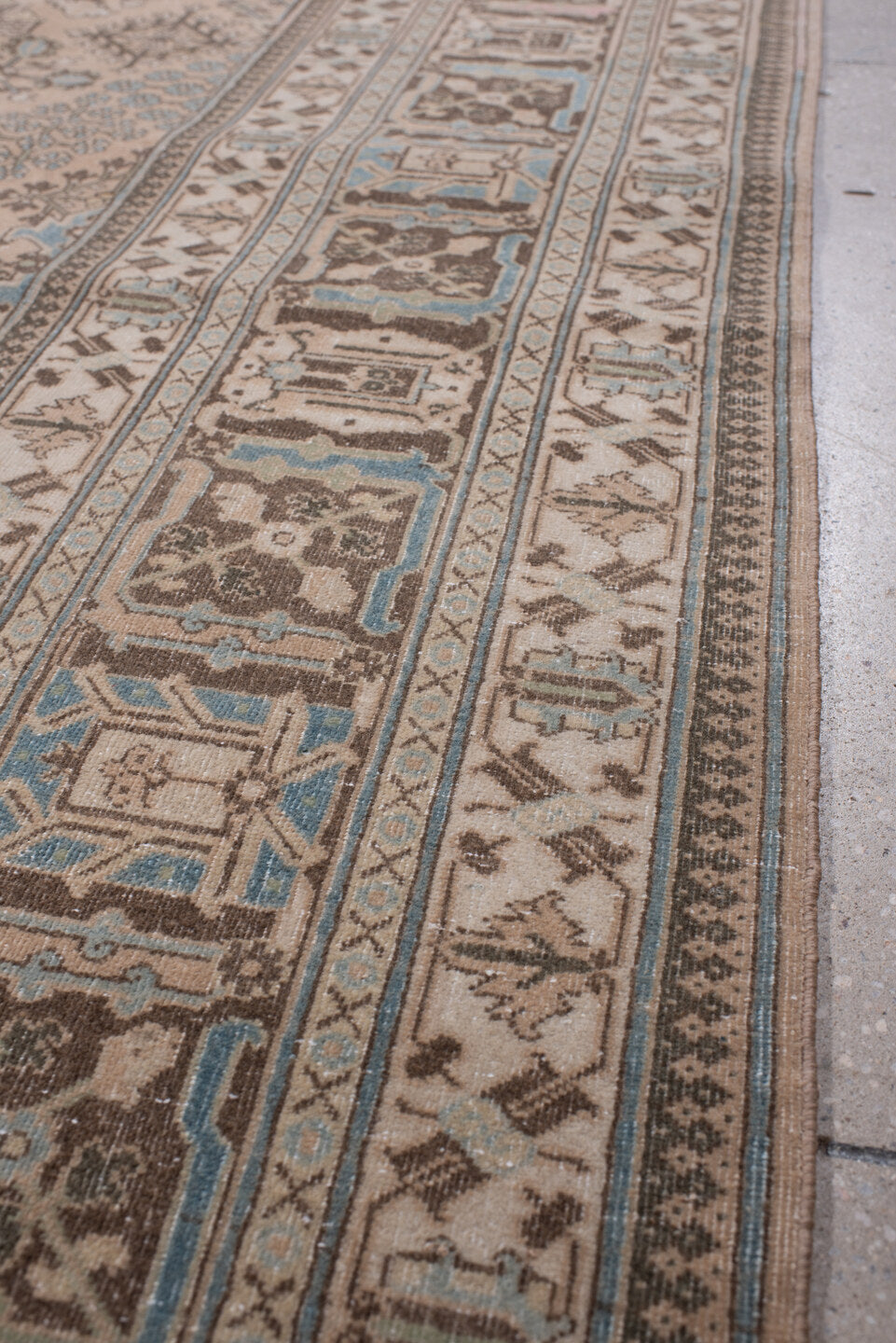 7' x 10' one-of-a-kind handmade antique Joshegan large size rug. Color palette: ivory, taupe, powder blue, charcoal, beige