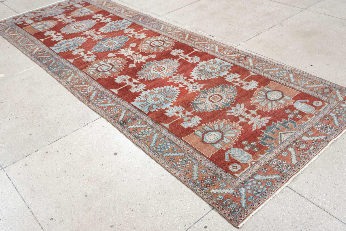 3' x 10' one-of-a-kind handmade antique Malayer runner rug. Color palette: rust, pale blue, ivory, terracotta, charcoal